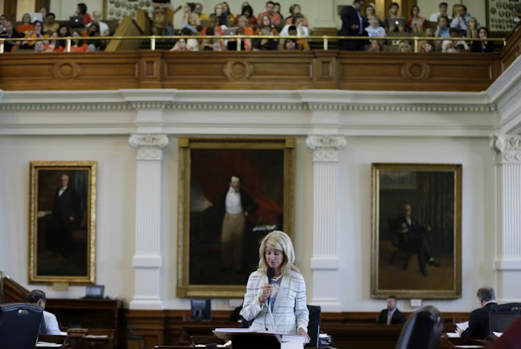 Texas state Sen. Wendy Davis filibusters an anti-abortion bill in 2013