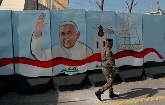 A mural depicting Pope Francis, Baghdad, Iraq