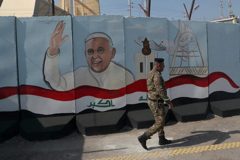 A mural depicting Pope Francis, Baghdad, Iraq