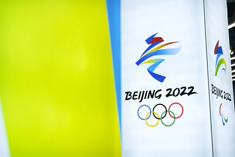 The logo for the Beijing 2022 Olympics is displayed at a venue