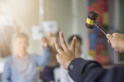 Why the competitive spirit can take over in auctions — and how you can stay in control