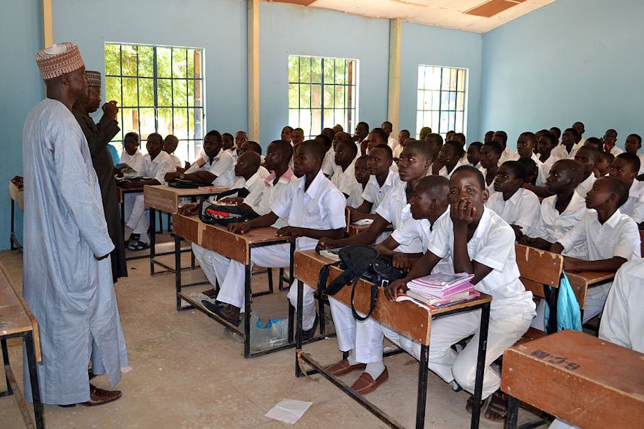 Students listening to a lecture in a classroom.