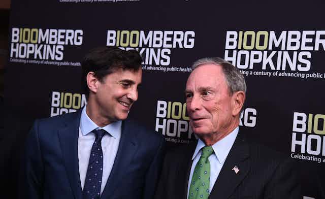 Johns Hopkins University President Ronald J. Daniels, left, and Michael Bloomberg 