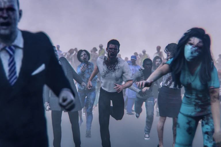 A horde of zombies running down the street.