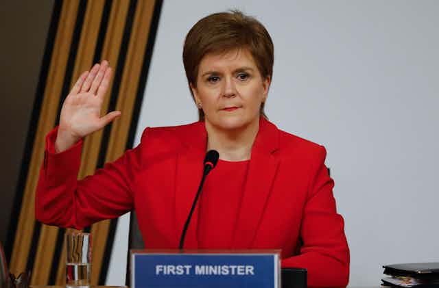 Nicola Sturgeon swearing her oath at the parliamentary inquiry into the Scottish government's botched handling of complaints a