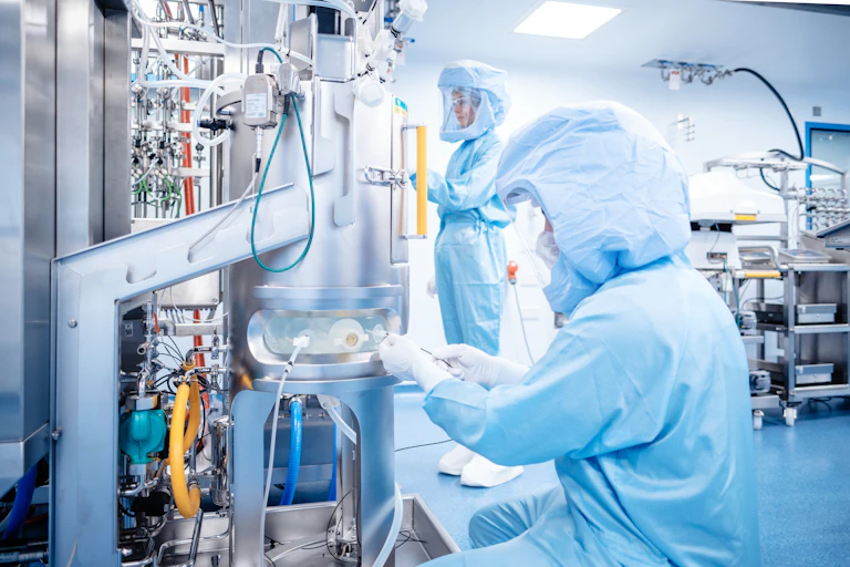 Vaccine developers working at a BioNTech facility.