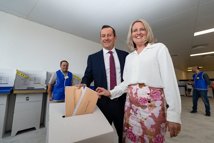 WA Premier Mark McGowan and his wife Sarah casting their votes at a pre-polling booth.