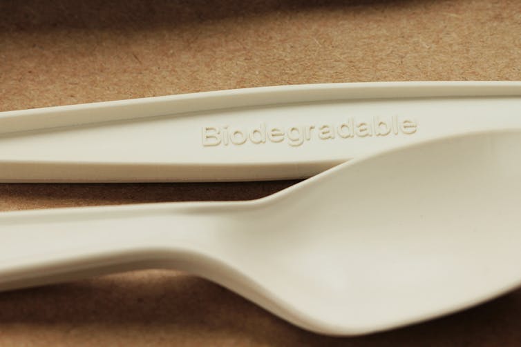 Plastic cutlery with 'biodegradable' written on it
