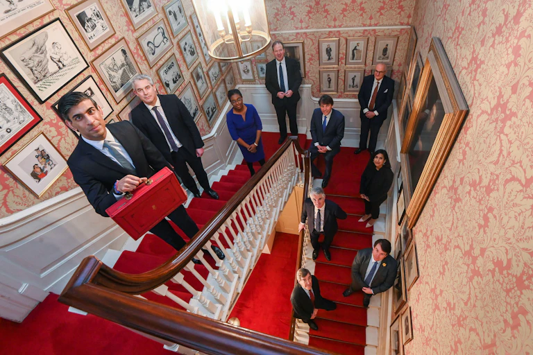 Rishi Sunak and Treasury staff pose ahead of the 2021 Budget announcement.