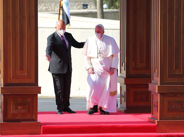 Pope Francis I and Iraqi president Barham Salih at the presidential palace in Baghdad.