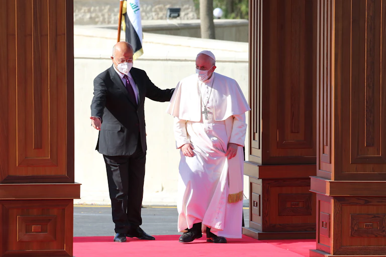 Pope Francis I and Iraqi president Barham Salih at the presidential palace in Baghdad.