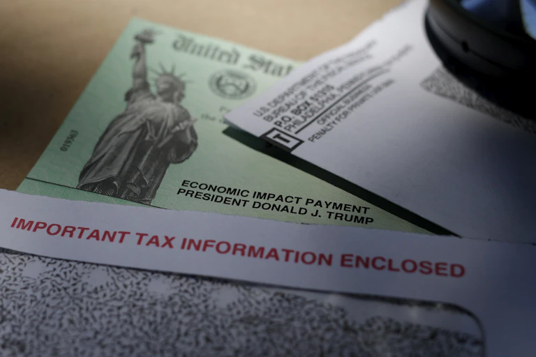 The first economic impact payment check sent out by the U.S. government bore former President Donald Trump's name