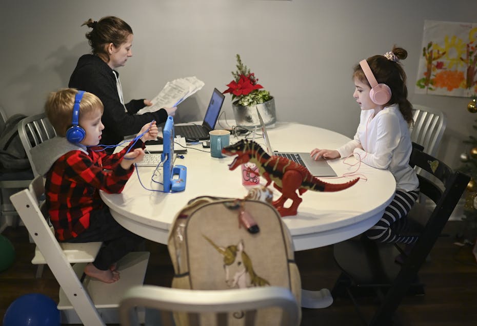 A family working at a table.