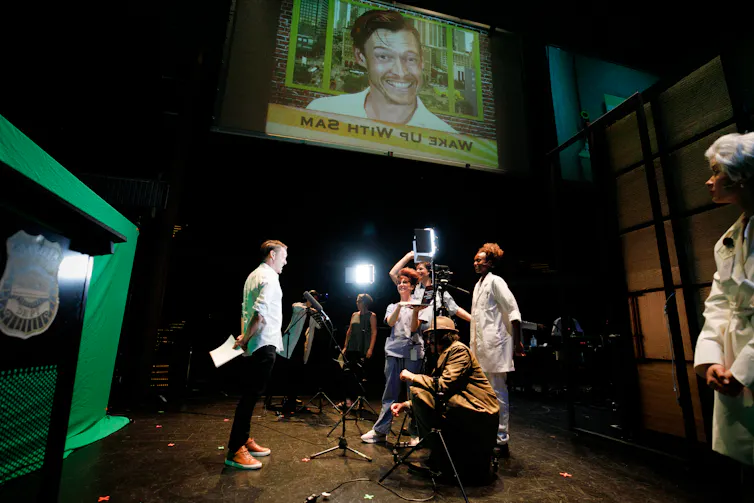 Creative Ensemble shooting live news with audience member