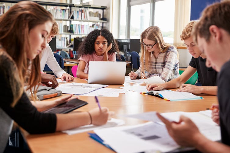 Young people studying together.