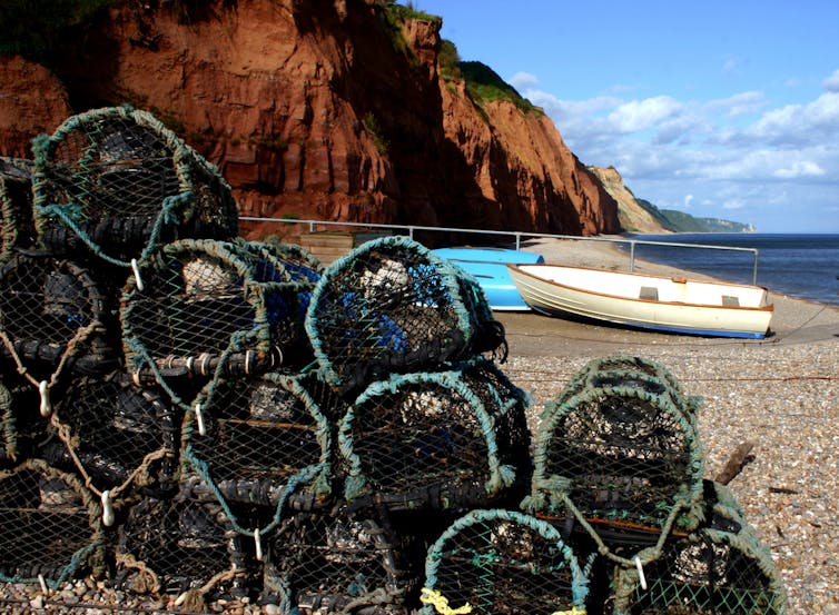 Crab baskets on a beach in Devon, UK.