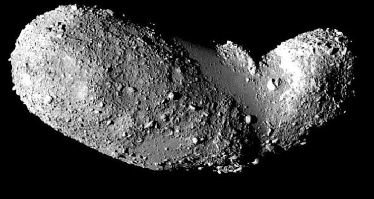 A rocky asteroid against a black background