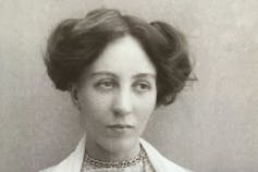 A black-and-white portrait of a woman