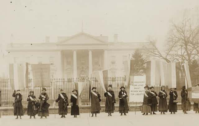 Women protest outside the White House