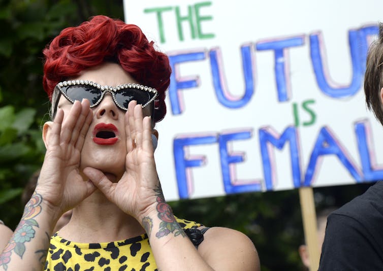 Woman marching for women's safety in 2019.