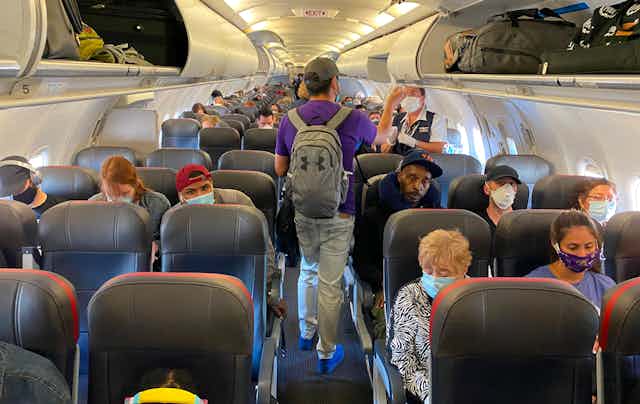 Passengers boarding a plane.