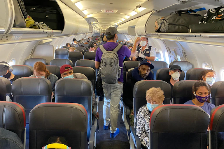 Passengers boarding a plane.