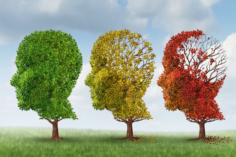 Three trees with foliage shaped like heads, progressively losing leaves