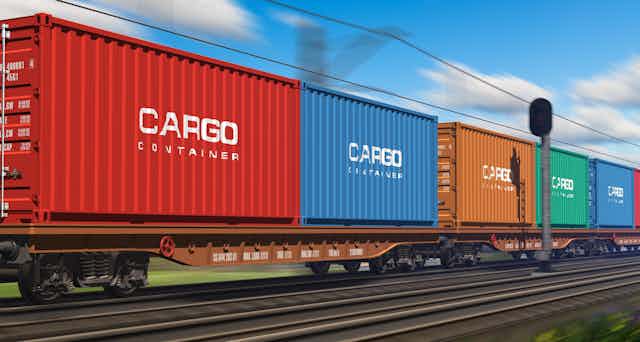 Freight train with colourful cargo wagons