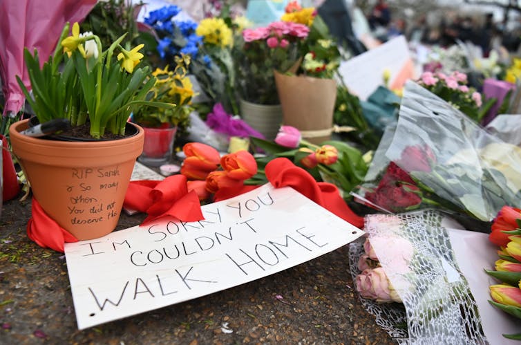 A sign left at the memorial for Sarah Everard reads: