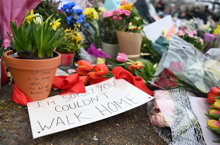 A sign left at the memorial for Sarah Everard reads: