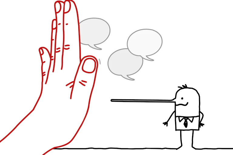 A hand stopping a Pinocchio-nosed person