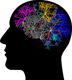 Silhouette of head with neuron clusters