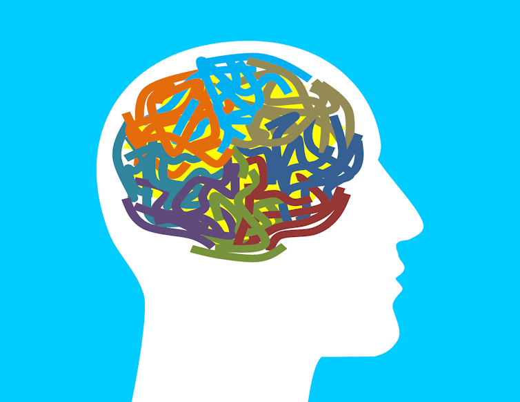 Silhouette of head with coloured scribbles for brain