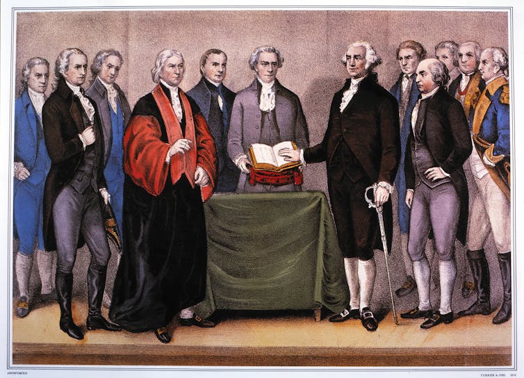 George Washington taking the oath of office among almost a dozen men.