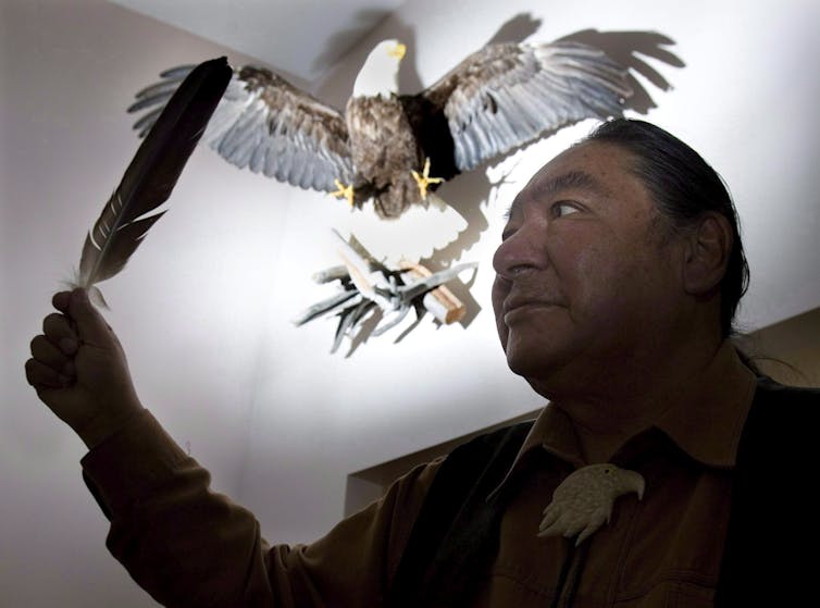The Search For A New Governor General Is Tough In A Disparate Nation Like Canada 16 Elijah Harper Holds Up An Eagle Feather.