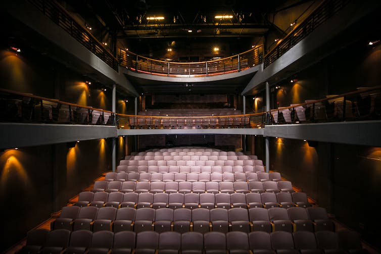 The interior of the main theatre auditorium. Photo courtesy The Fugard Theatre An empty theatre, lights shining on rows of old seats, an air of vintage.