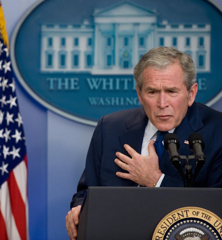 President George W. Bush speaking to the press.