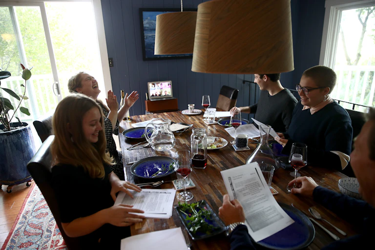 A Jewish family celebrates Passover through videoconferencing.