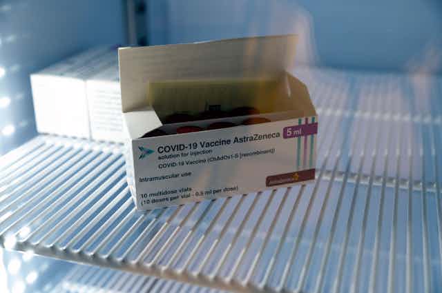 A box containing vials of AstraZeneca vaccine.