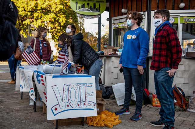 College students urge people to vote