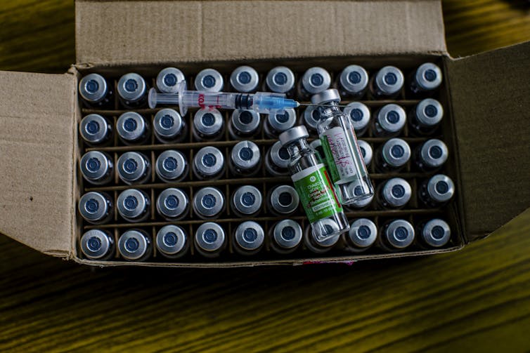 A box full of vaccine vials.