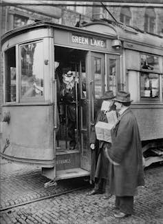 men with a tram