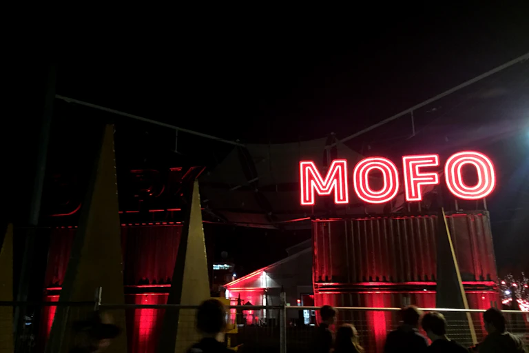 Neon red sign reading 'Mofo'