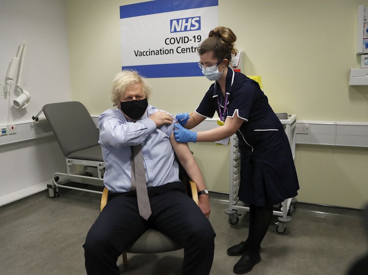 Boris Johnson receives the vaccine.