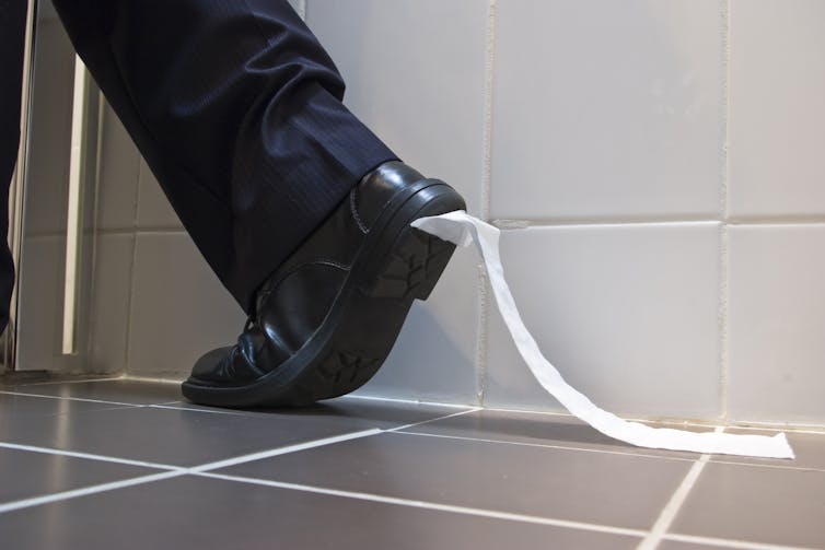 Toilet paper stuck to shoe leaves bathroom