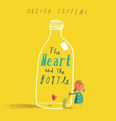 Cover of The Heart and the Bottle featuring a large bottle with a little girl next to it.