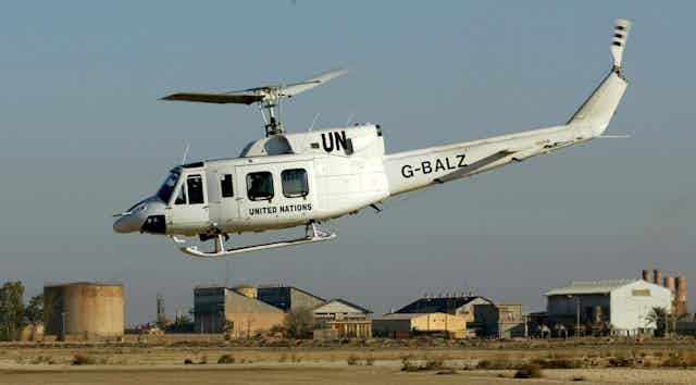  A UN helicopter with weapons inspectors on board takes of from an oil facility near the city of al-Hadithah, 300km northwest of Baghdad, 11 January 2003.