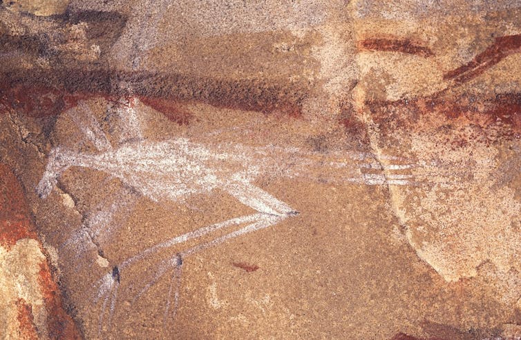 Photograph of the rhebok-headed image moving down the line. Rock Art Reseach Institute and www.sarada.co.za Rhebok therianthrope.