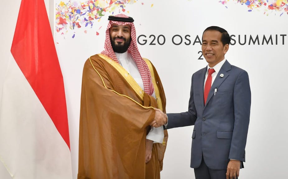 Crown Prince of Saudi Arabia Prince Mohammad bin Salman shakes hands with Indonesian President Joko Widodo on the sidelines of the Group of 20 Summit in Osaka, Japan, in 2019.