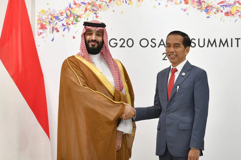 Crown Prince of Saudi Arabia Prince Mohammad bin Salman shakes hands with Indonesian President Joko Widodo on the sidelines of the Group of 20 Summit in Osaka, Japan, in 2019.
